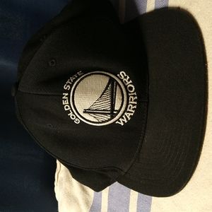 Mitchell & Ness Golden State Warriors Ball Cap. Black and adjustable.